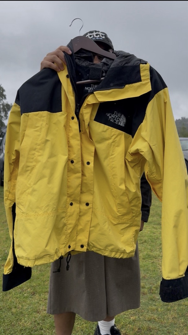 Video frame: the front of a yellow jacket
