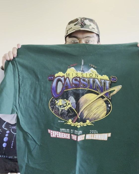 Green graphic t-shirt, consistent background