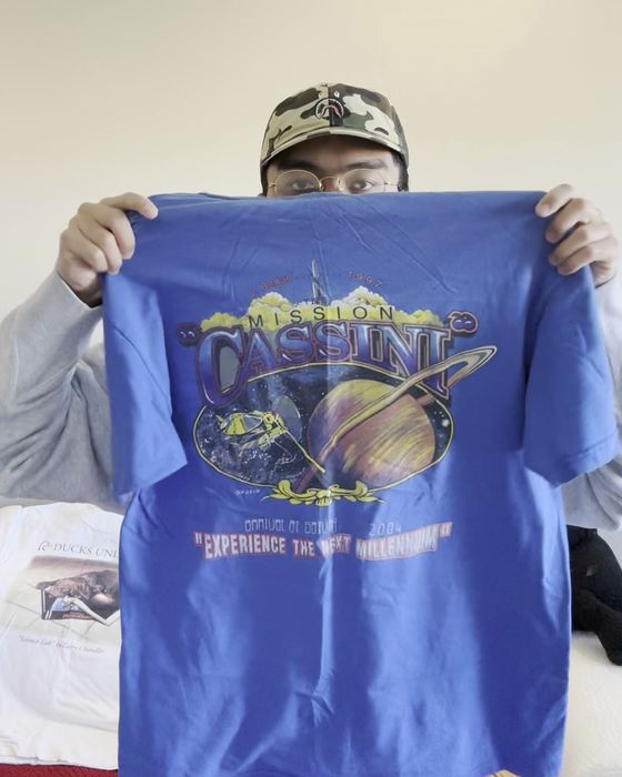 Blue graphic t-shirt, consistent background